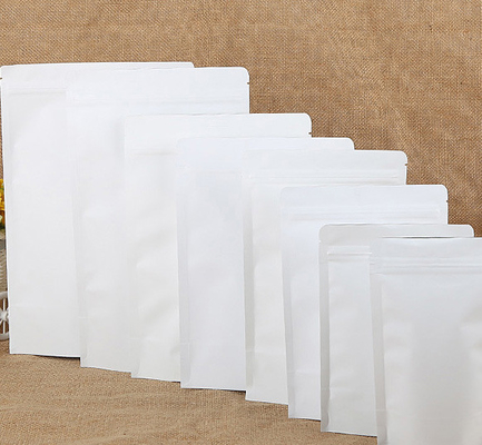 アルミニウムで処理された白いジップ ロック式のクラフト紙袋の自己支持のジッパー袋